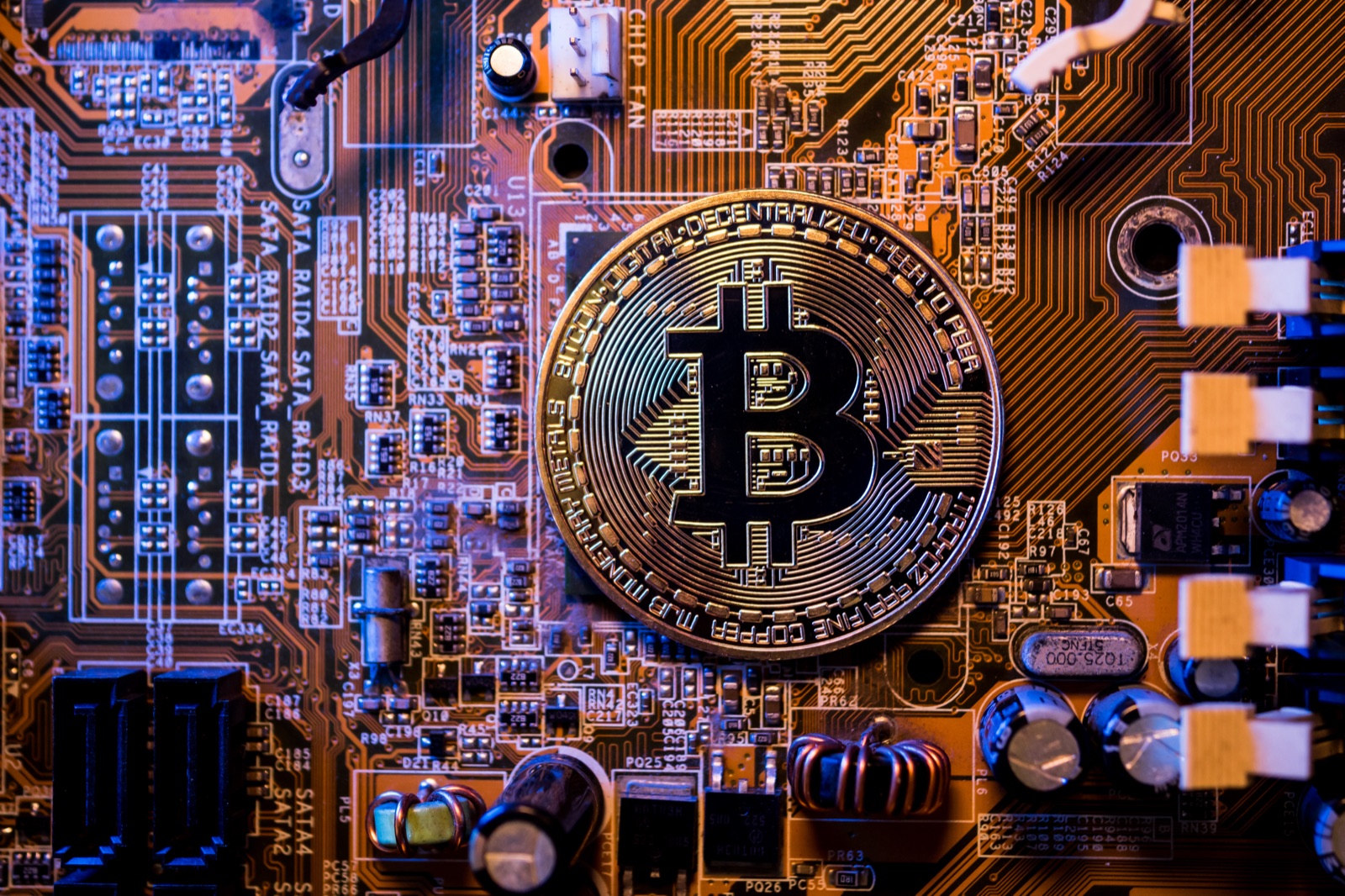 Bitcoin coins on a circuit board — automated crypto execution